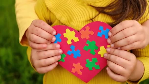 Two Girls Holding Red Heart Colorful Puzzles Made Own Hands — Stock Video