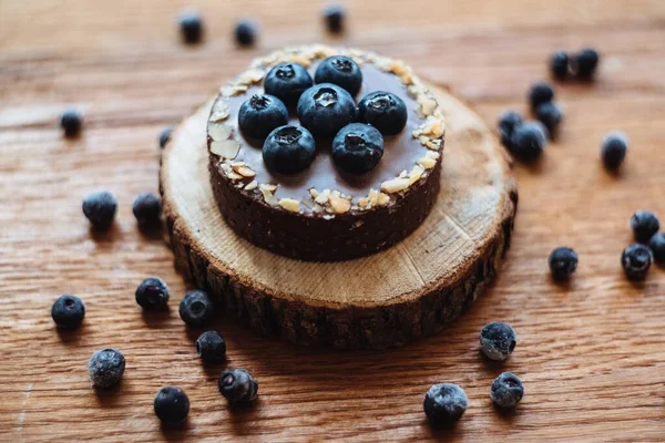Delicious Tartlet Fresh Blueberries Chocolate Wooden Background Trendy Dessert Top — Stock Photo, Image