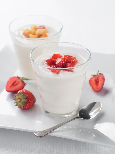 Glasses with fruit and berry yogurt — Stock Photo, Image