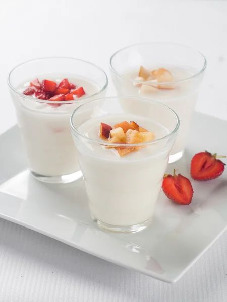 Glasses with fruit and berry yogurt — Stock Photo, Image