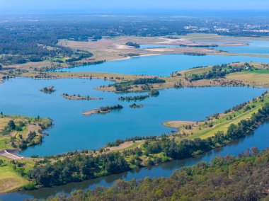 Drone aerial photograph of the Nepean River and large water reservoirs in the Cumberland Plain region of Hawkesbury Heights looking towards Penrith in NSW, Australia.