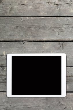 Tablet bilgisayarda eski ahşap masa
