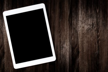 Tablet bilgisayarda eski ahşap masa
