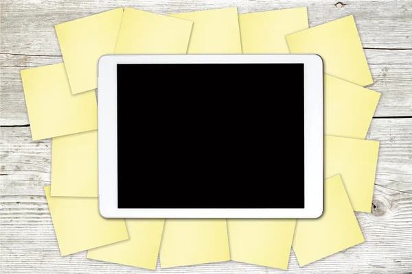 Sticky notes around the tablet — Stock Photo, Image