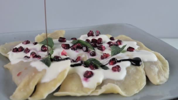 Fresh Dumplings Fruit Served Plate Decorated Nuts Pomegranate Seeds Cream — Stock Video