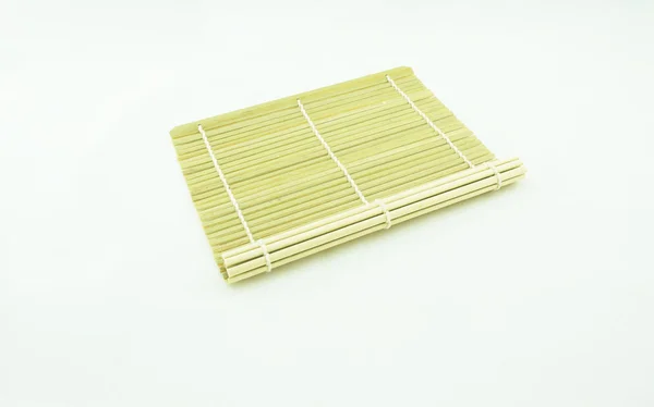 Toalha de mesa de bambu no fundo branco — Fotografia de Stock