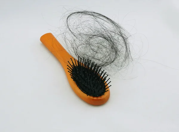 Peine y caída del cabello — Foto de Stock