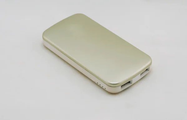 Gold colour external battery — Stock Photo, Image