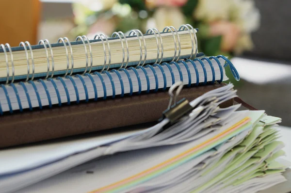 Three notebooks and stack of document — Stock Photo, Image