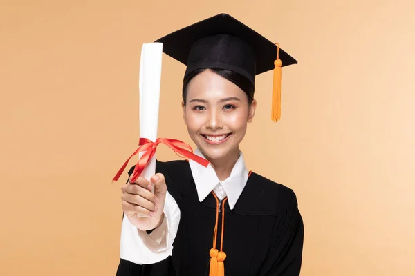 Happy Graduate Asian Woman Cap Gowm Holding Certificated Diploma Beige — Stock Photo, Image