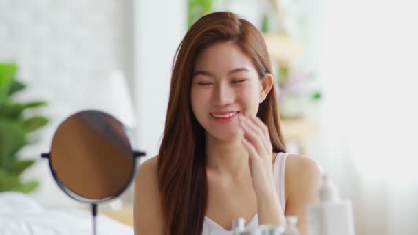 Happy Asian Young Woman Smile Looking Mirror Doing Skin Care — Stock Video