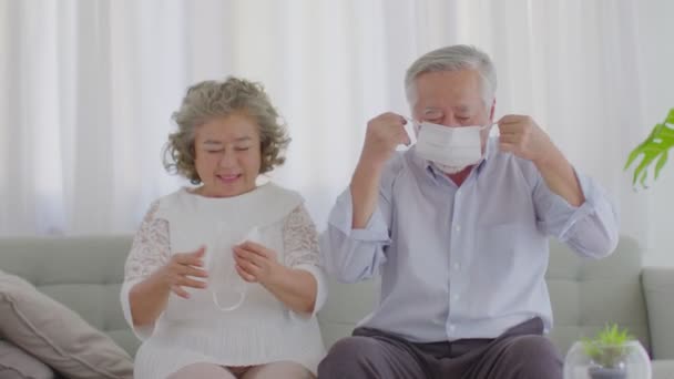 Happy Asian Elderly Seniors Couple Wearing Medical Mask Together Prevent Stock Video