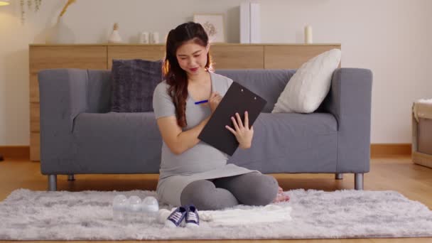 Asian Pregnant Woman Writing Checklist Preparing Baby Home Pregnant Woman — Stock Video