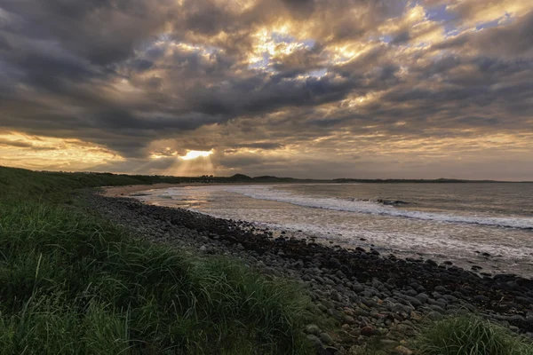 Solnedgången northumberland, — Stockfoto