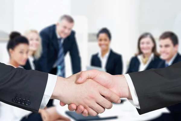 Business handshake and business people Royalty Free Stock Images