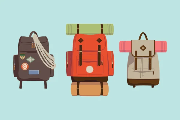 Tres mochilas para caminar . — Vector de stock