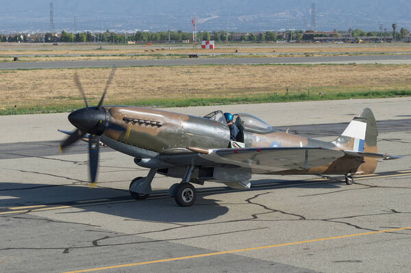 Supermarine Spitfire Mk XIV (registration NX749DP) taxing at the Chino Airport in Southern California.