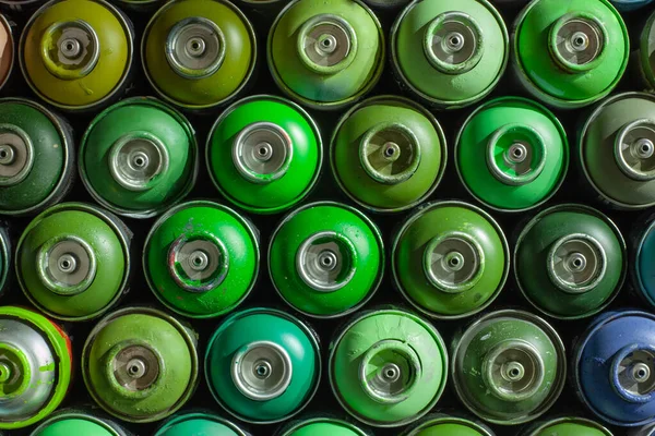 Background of empty cans of paint for graffiti. Tools for street art — Stock Photo, Image