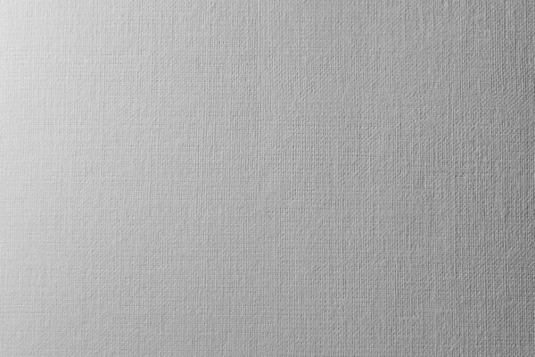 texture White paper background, texture in hard light. of white perforated paper with imitation of canvas, embossed in hard light with harsh relief shadows.