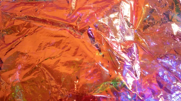 Holographic Background Real Texture Iridescent Film Bright Orange Colors — Stock Photo, Image