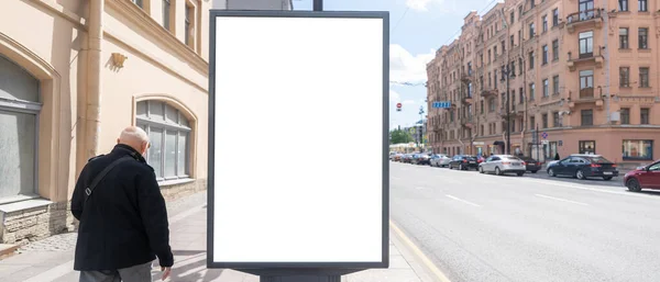 billboard advertising vertical poster on the street