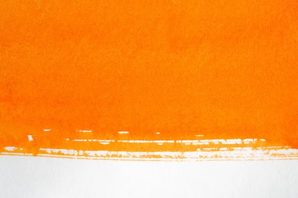 orange watercolor background, paper test with paint mostly painted over with a horizontal separation line with white paper.