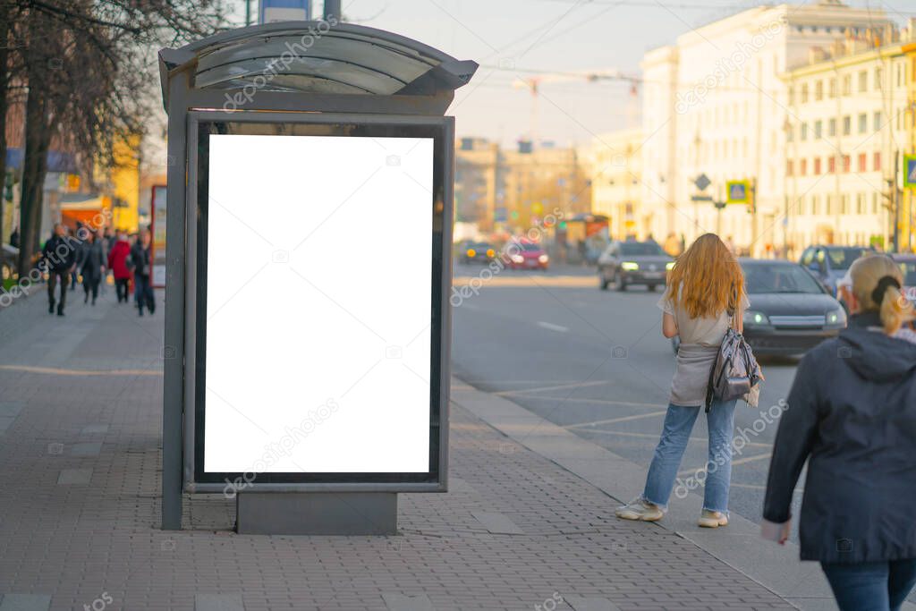 Vertical billboard lightbox in the city. for placing the MOCKUP advertisement advertising in the bus shelter.