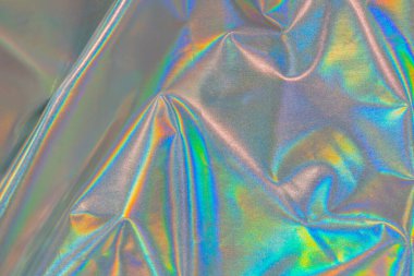 Yanardöner kumaş modayı holografik arka plan. Gökkuşağı arkaplan renkli krom kumaş.