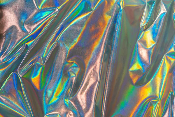 Yanardöner kumaş modayı holografik arka plan. Renkli krom kumaş.