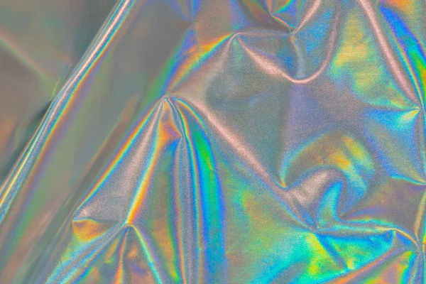Yanardöner kumaş modayı holografik arka plan. Gökkuşağı arkaplan renkli krom kumaş.