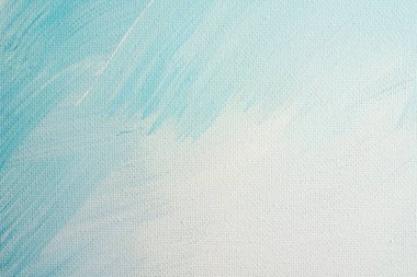 Soyut arkaplan. Mavi tonlarda beyaz boya ile kaplanmış tuval.