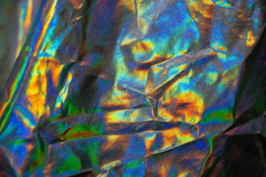 Yanardöner kumaş holografik arka plan. Kırışık, yanar döner kumaş.