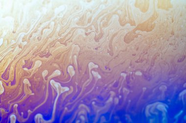 Bir sabun köpüğü kürenin yüzeyinde yanardöner gökkuşağı. Renkli arkaplan