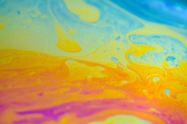 Soyut sıcak sarı arka plan. Sabun köpüğü dokusu