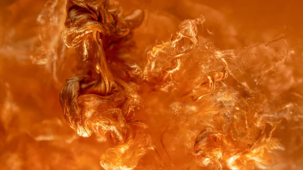 Partículas Tinta Brilhando Água Nuvens Salpicos Ouro Tinta Tinta Dourada — Fotografia de Stock