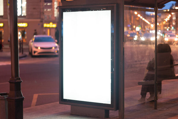 Blank Banner light box Mockup Media Advertising. In the city on the street in the evening