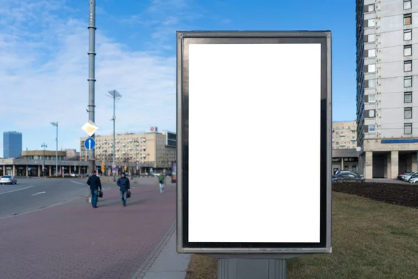 Vertical City Billboard Standing Green Lawn Curb People Walking Distance — Stock Photo, Image