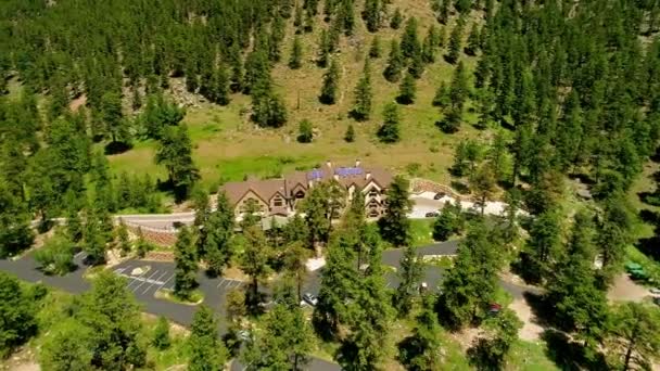 Pov Aerial Large Building Surrounded Green Trees — Stock Video