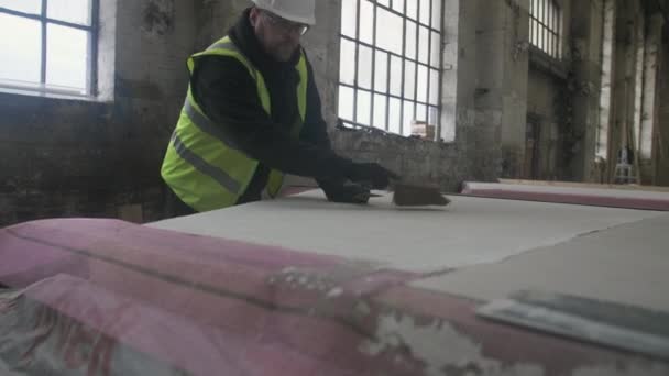 Construction Worker Brushing Surface Mansfield Nottinghamshire — Stock video