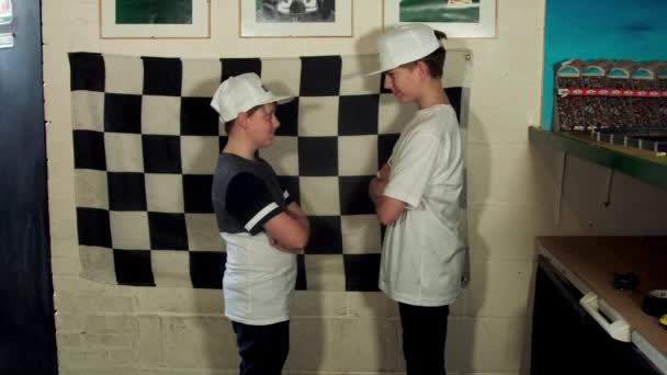 Two Boys Standing Face Face Racing Slot Cars Nottingham — Stock Video