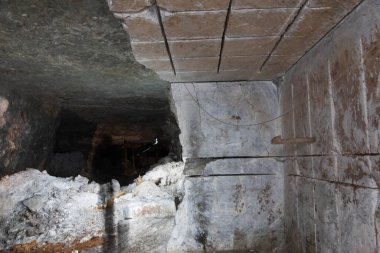 large man-made cave in the mountain