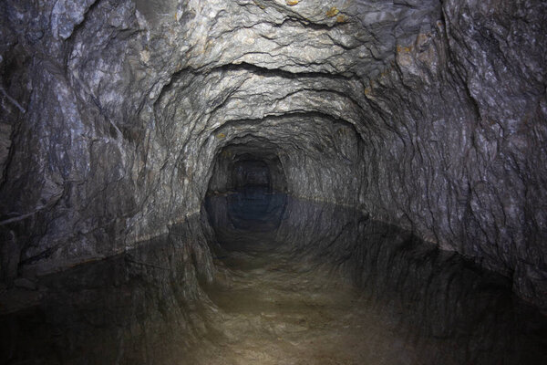 large man-made cave in the mountain