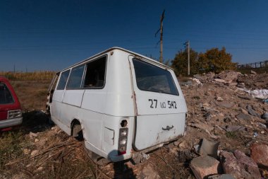 disassembled abandoned cars in poor condition