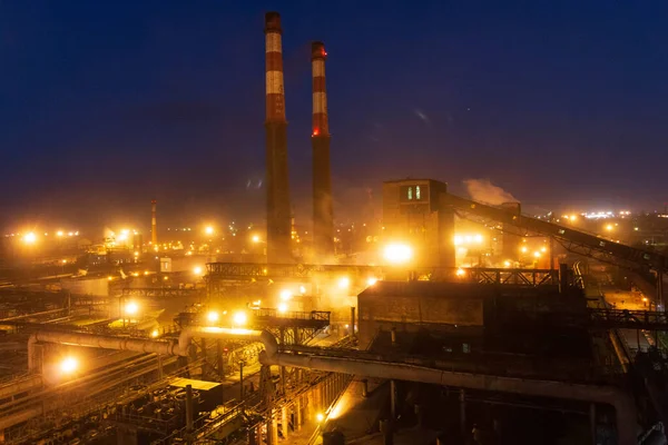 factory worker lights at night