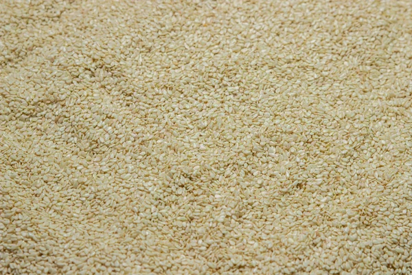 Tam ekran susam. Beyaz susam. Pişirme serpintileri