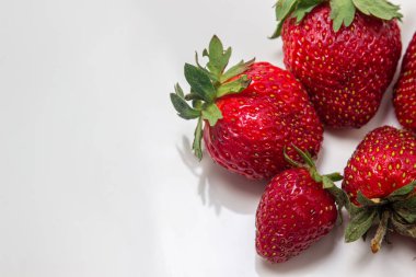 Strawberries on a white background. Fresh ripe strawberries. Healthy diet.