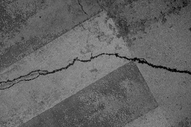 Soyut arkaplan. Monokrom dokusu. Görüntü, siyah ve beyaz tonun etkilerini de içeriyor. Kasılma ve kurutma efektleri çatlatır