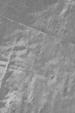 Soyut arkaplan. Monokrom dokusu. Görüntü, siyah ve beyaz tonun etkilerini de içeriyor. Kasılma ve kurutma efektleri çatlatır