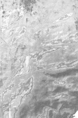 Soyut arkaplan. Monokrom dokusu. Görüntü, siyah ve beyaz tonun etkilerini de içeriyor. Kasılma ve kurutma efektleri çatlatır