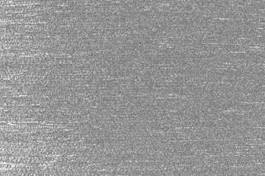 Çizik ve çatlaklarla bembeyaz bir doku.